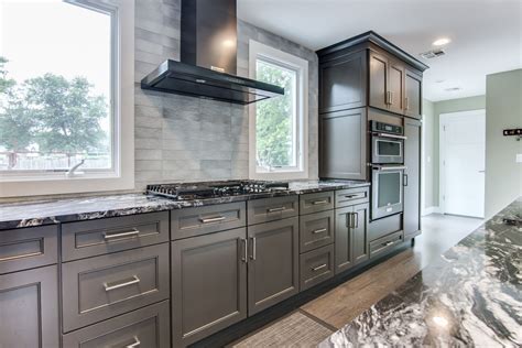 gray kitchen cabinets with black stainless steel appliances|black stainless steel cabinet color schemes.